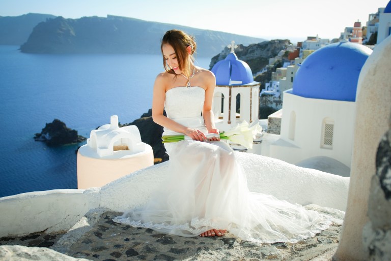 Photography by the Oia blue rooftop church
