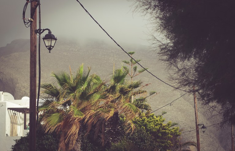 Santorini Perissa beach in winter time. Mist.