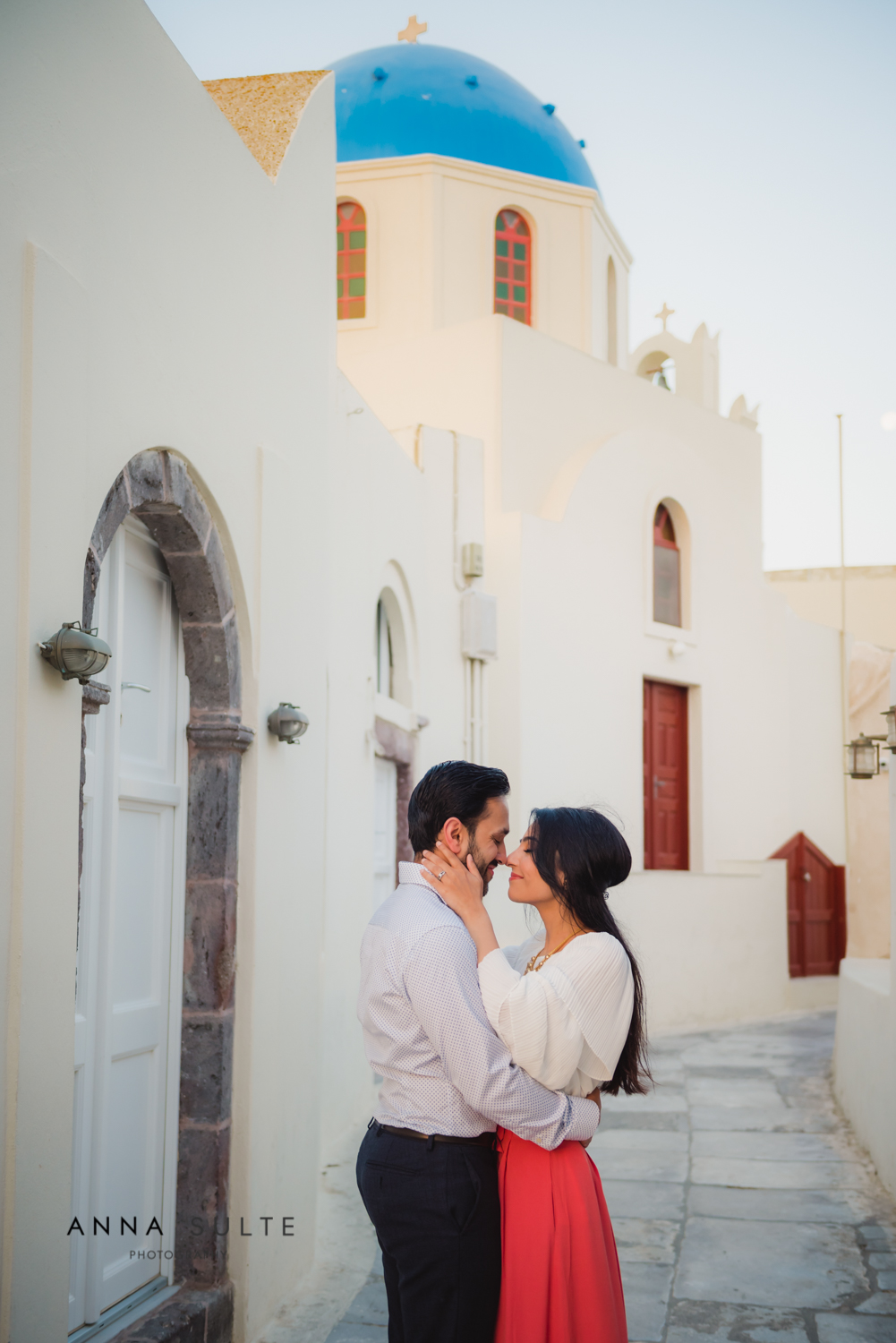 Husband and wife on the street in Santorini