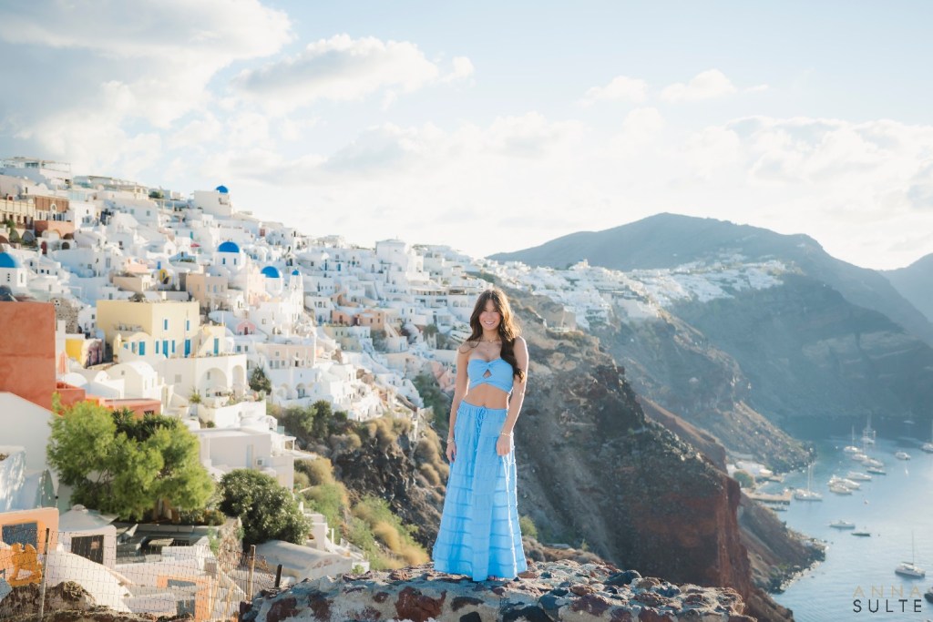 Wide cliffside teen photoshoot in Santorini, Greece