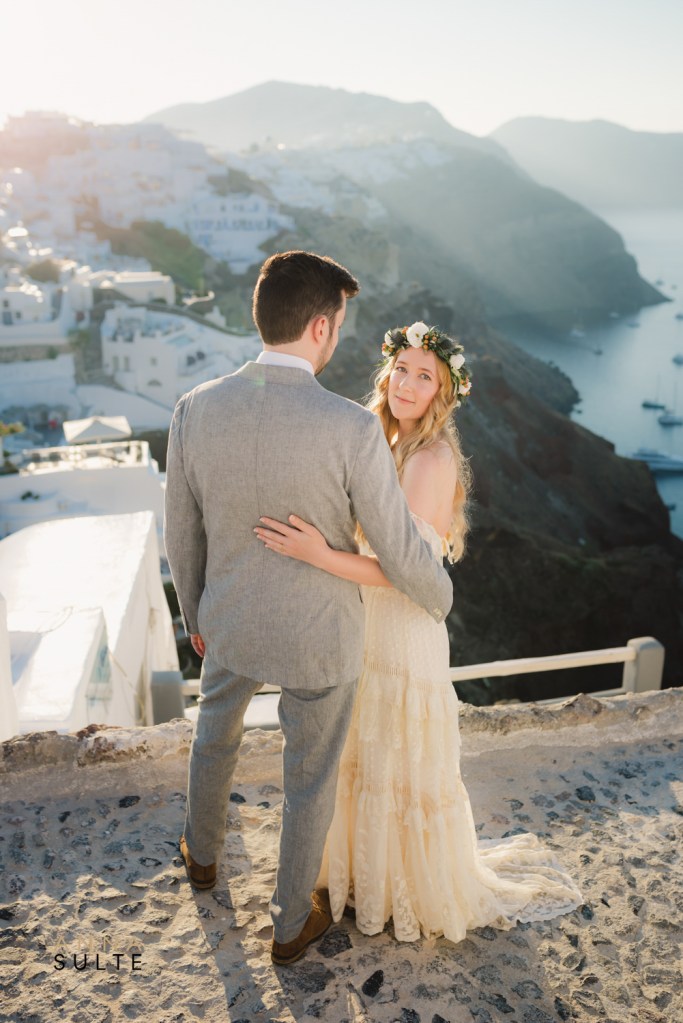 Santorini engagement photos in the quiet streets of Oia village
