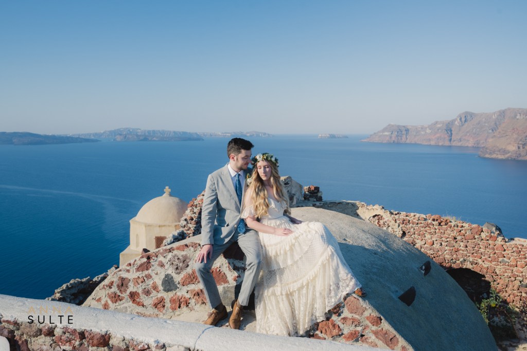 Wide village view during a Santorini photo session in Oia at sunset