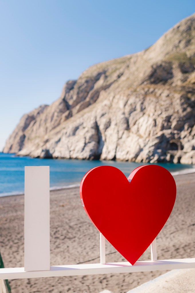 I love sign in Santorini. Kamari beach.